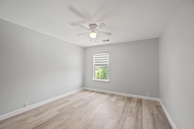 spare room with ceiling fan and light hardwood / wood-style floors