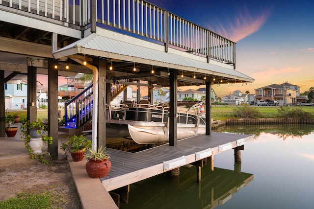 view of dock with a water view