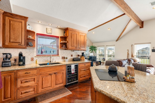 kitchen featuring vaulted ceiling with beams, tasteful backsplash, wine cooler, and sink