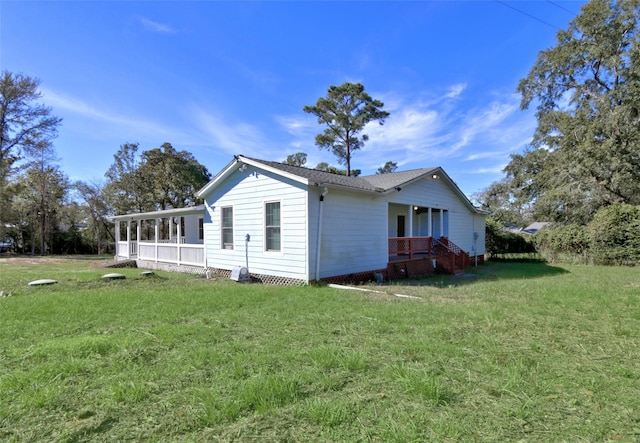 view of property exterior with a yard