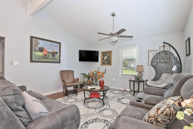 living room featuring vaulted ceiling with beams and ceiling fan