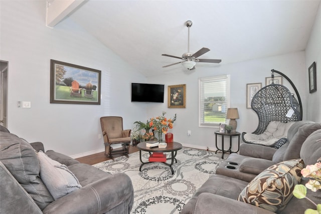 170 Mesa Verde, Livingston, TX 77351 - living area featuring wood finished floors, a ceiling fan, baseboards, and lofted ceiling with beams