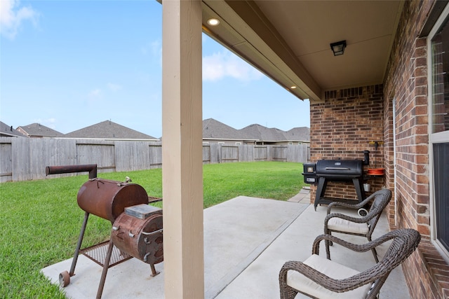 view of patio with a grill