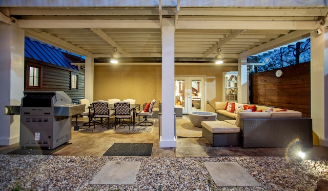 view of patio featuring french doors and an outdoor living space