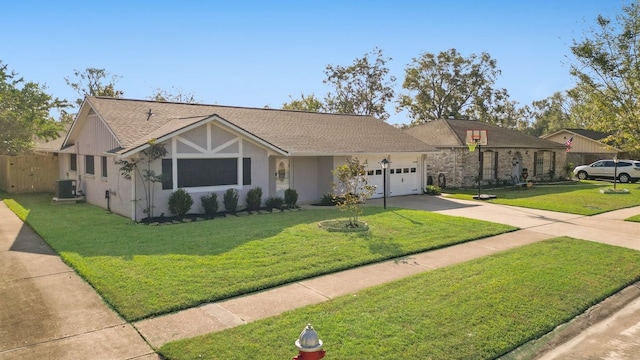 ranch-style home featuring central AC unit, a front yard, and a garage