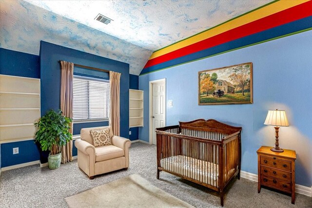 bedroom with vaulted ceiling, carpet, visible vents, and baseboards