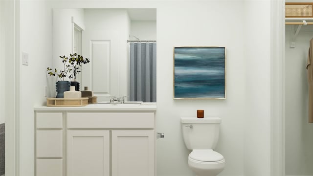 bathroom featuring a shower with shower curtain, vanity, and toilet