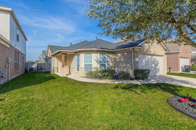 view of front of home with central AC and a front lawn