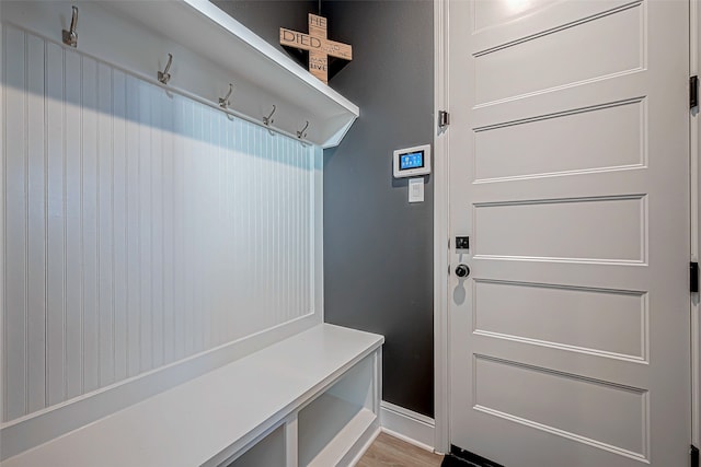 mudroom with light hardwood / wood-style flooring