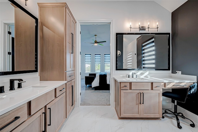 bathroom with vanity, lofted ceiling, and ceiling fan