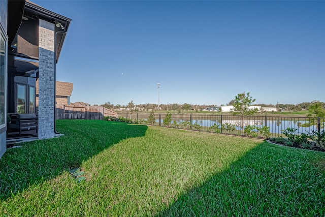 view of yard featuring a water view