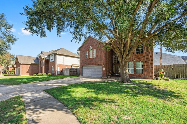 view of front property featuring a garage and a front yard