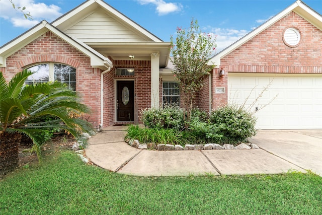 view of front of home with a garage