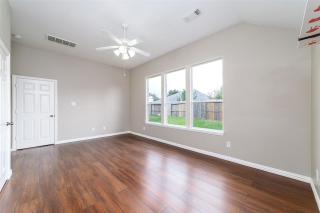 unfurnished room featuring ceiling fan, dark hardwood / wood-style flooring, and lofted ceiling