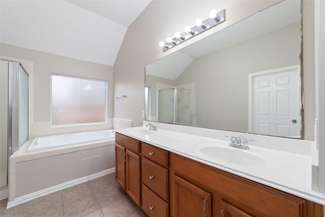 bathroom with vanity, tile patterned floors, lofted ceiling, and separate shower and tub