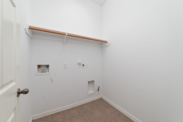 washroom with electric dryer hookup, hookup for a gas dryer, washer hookup, and dark tile patterned flooring