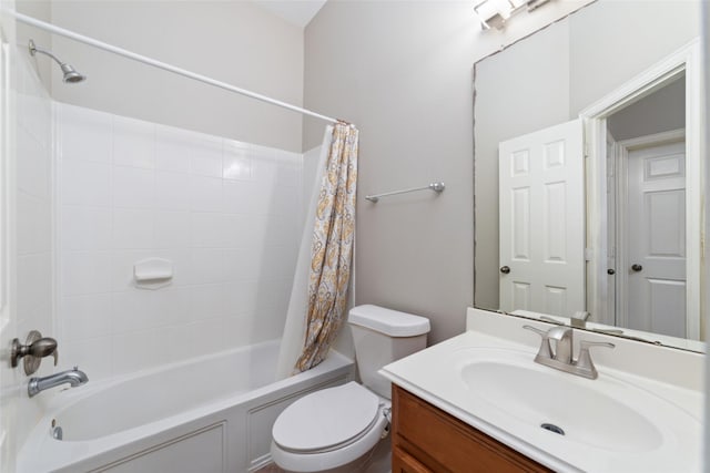 full bathroom with shower / bath combination with curtain, toilet, and vanity