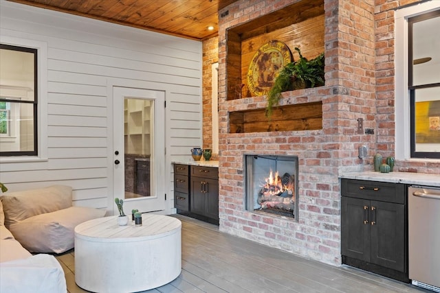 interior space featuring a brick fireplace