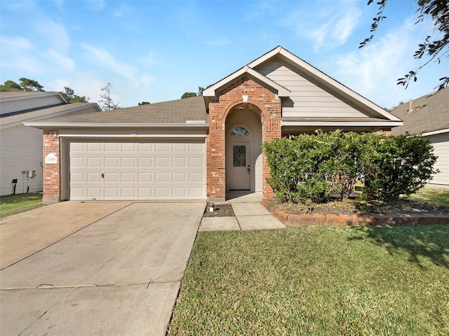 ranch-style house with a garage and a front lawn