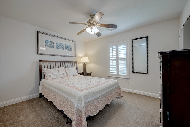 bedroom with light carpet and ceiling fan