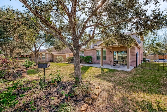 view of yard with a patio area