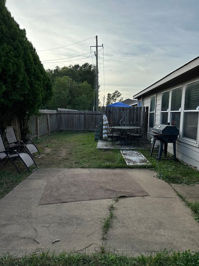 view of yard with a patio area