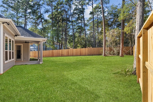 view of yard featuring a fenced backyard