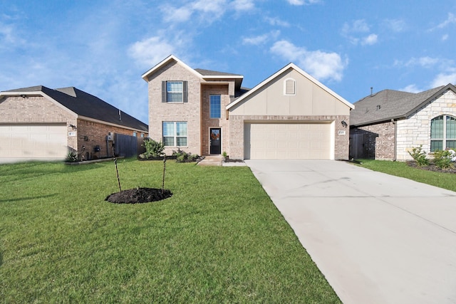 view of property with a front yard and a garage