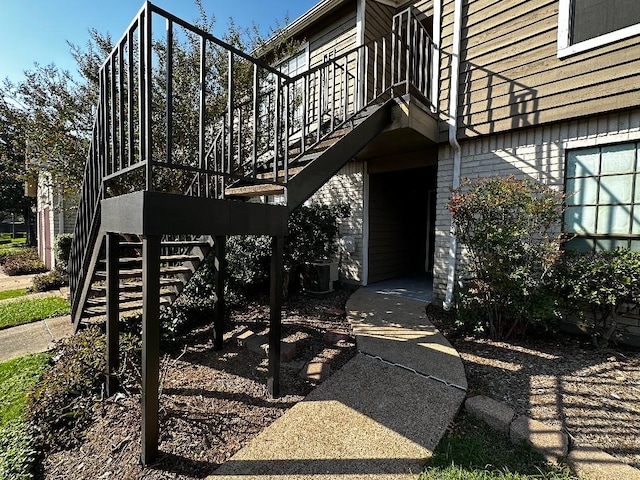 property entrance featuring central AC