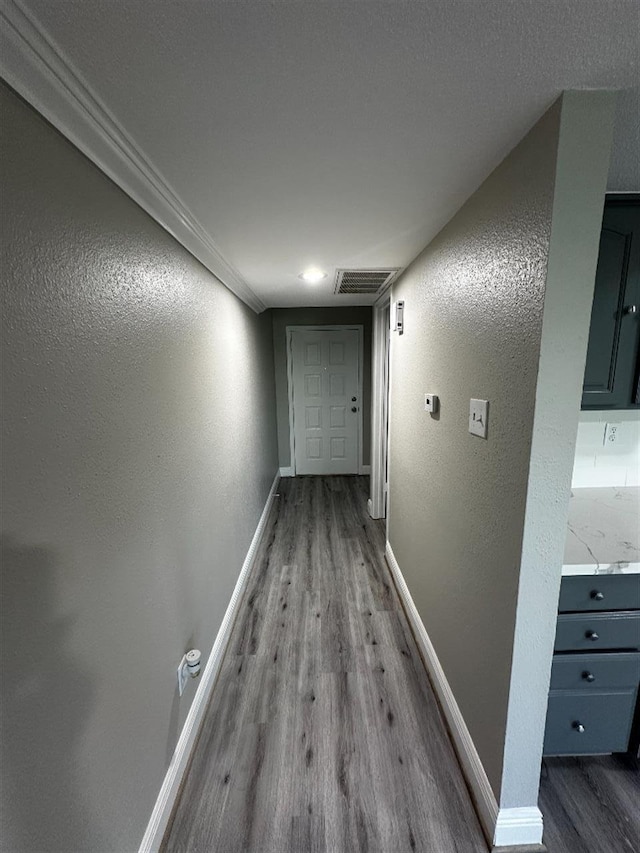 corridor featuring hardwood / wood-style flooring