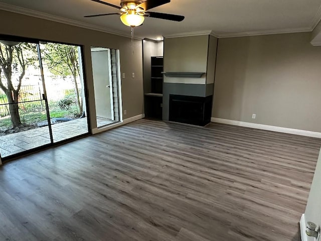 unfurnished living room with crown molding, ceiling fan, and wood-type flooring