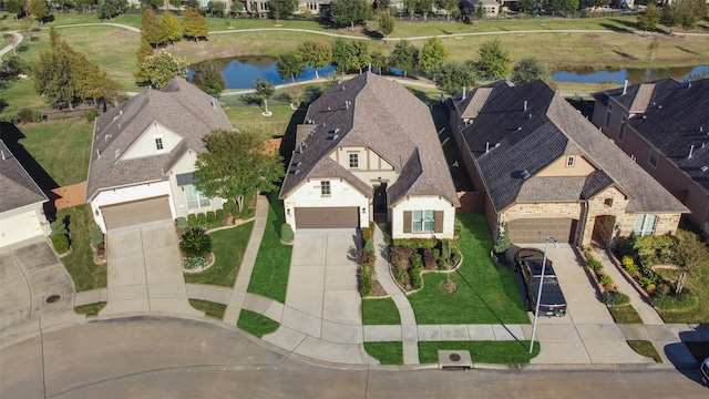 drone / aerial view with a water view