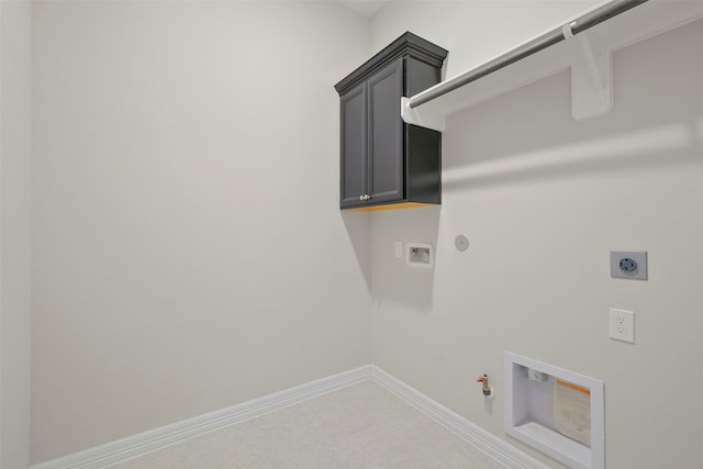 washroom featuring cabinets, hookup for a washing machine, gas dryer hookup, and electric dryer hookup