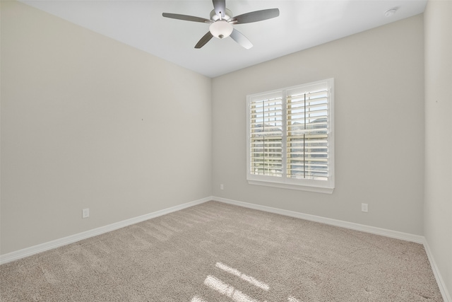 unfurnished room featuring carpet floors and ceiling fan