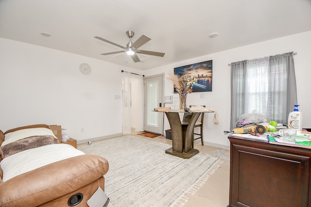 interior space featuring ceiling fan