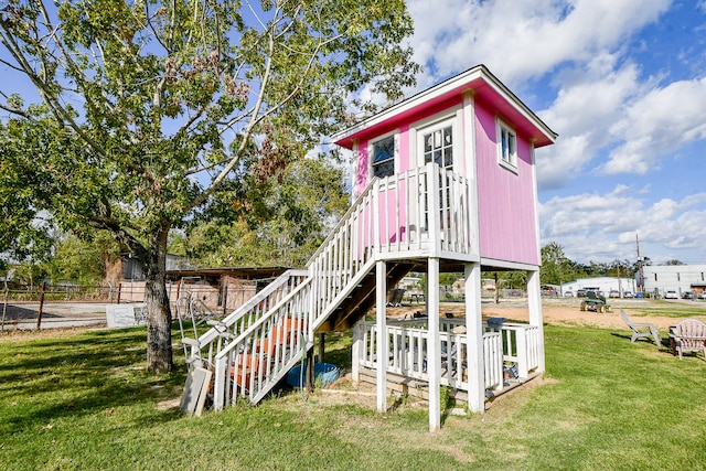 view of playground with a yard