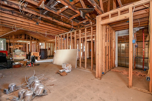 miscellaneous room featuring lofted ceiling