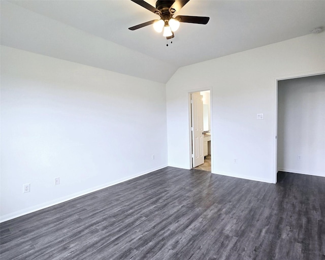 unfurnished bedroom with ceiling fan, dark wood-type flooring, and vaulted ceiling