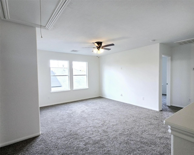 carpeted empty room with ceiling fan