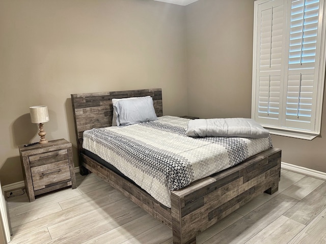 bedroom featuring light hardwood / wood-style floors