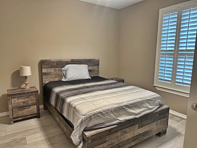 bedroom featuring light hardwood / wood-style flooring