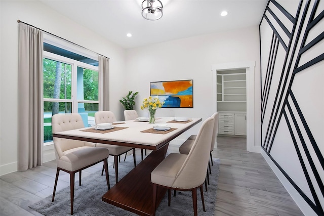 dining space featuring hardwood / wood-style flooring