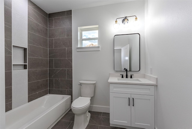 full bathroom with tile patterned floors, vanity, toilet, and tiled shower / bath combo