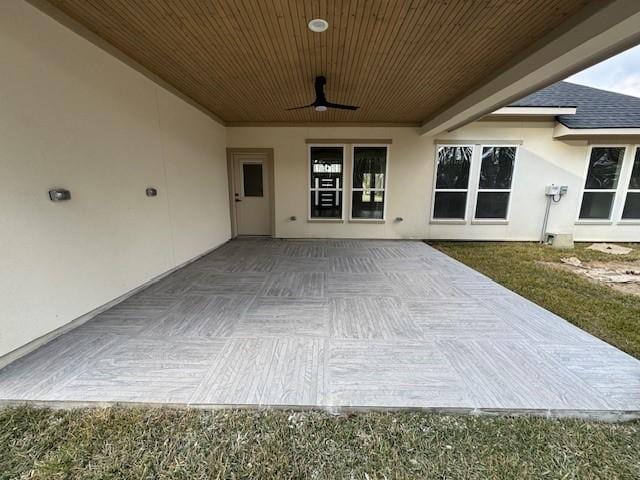 view of patio featuring ceiling fan