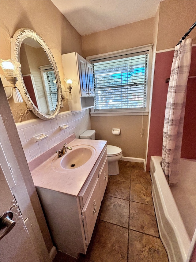 full bathroom featuring tasteful backsplash, tile patterned floors, vanity, shower / bathtub combination with curtain, and toilet