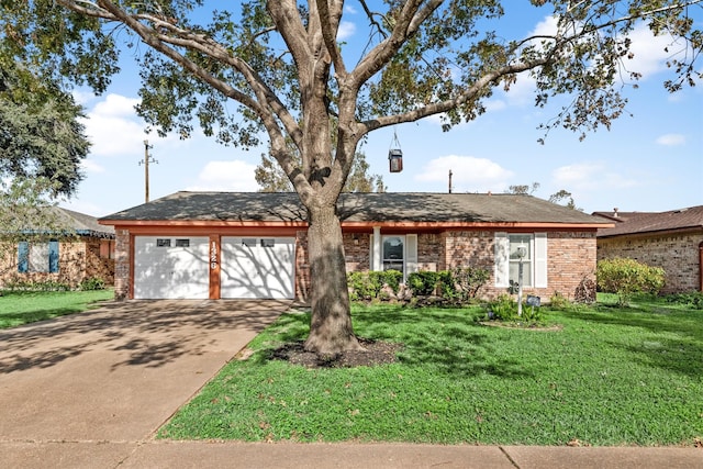 ranch-style home featuring a garage and a front lawn