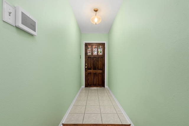 entryway featuring light tile patterned floors