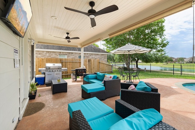 view of patio / terrace featuring outdoor lounge area and a grill