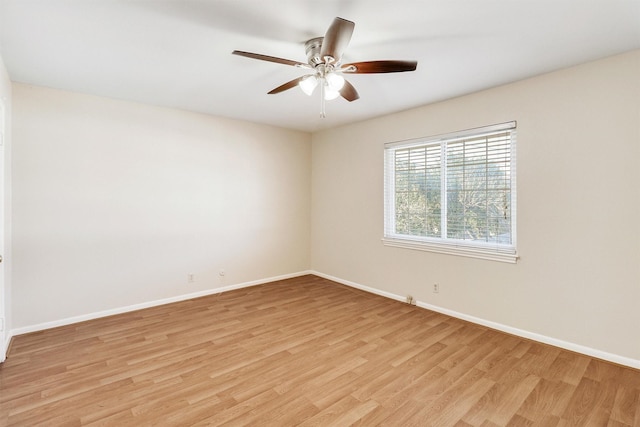 unfurnished room featuring ceiling fan and light wood-type flooring