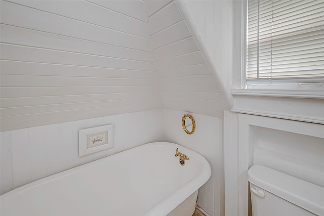 614 Clear Lake Rd, Kemah, TX 77565 - full bathroom featuring a freestanding tub and toilet